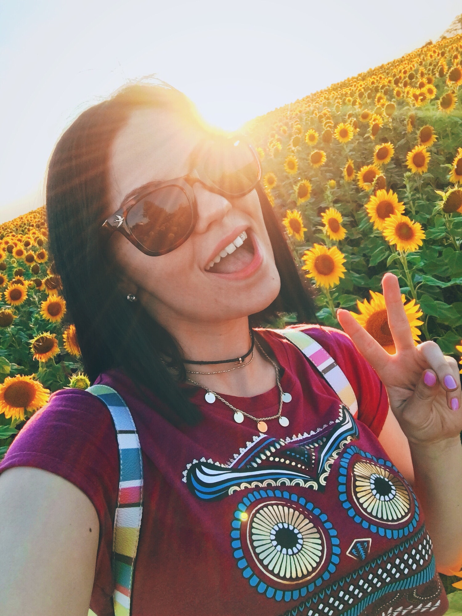 Happy selfie in sunflowers field